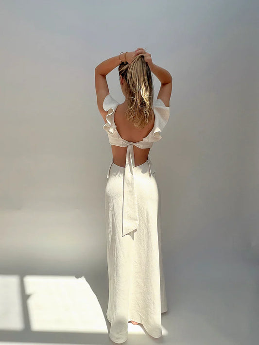 Model showcasing back of Cienti Flounce Maxi Dress - designer dress hire New Zealand