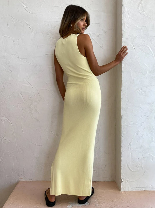 Model wearing and showcasing Kelvin Draped Dress In Lemon - Designer Dress Rental from Lend the Label
