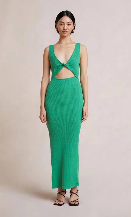 Model wearing Riviera Knit Midi Dress in gorgeous green fabric with split in leg - Designer Dress Rental from Lend the Label