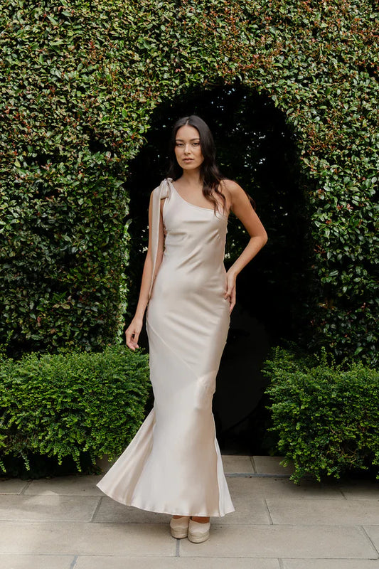 Model wearing One Shoulder Wilmer by Caitlin Crisp in 100% silk - designer dress rental.