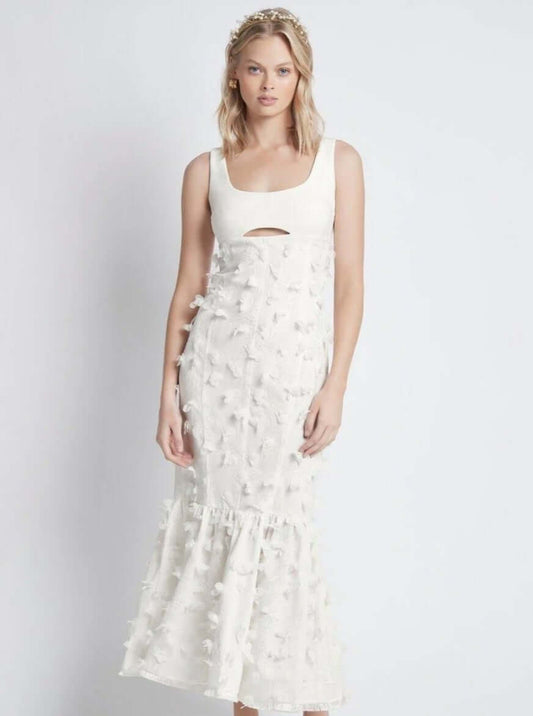 Model wearing Petal Dreams dress in white, showcasing bodice in plain non stretch crepe