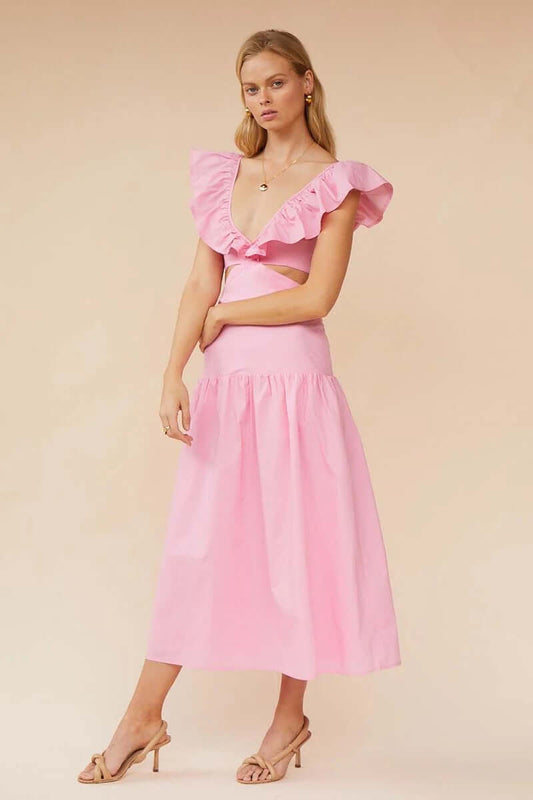 Model wearing a pink Rosanna Ruffle Cut Out Midi dress with a plunging V neckline and ruffled sleeves.