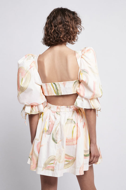 Model wearing Aje Imprint Mini Dress, a classic Aje style. Model showcasing front of dress.