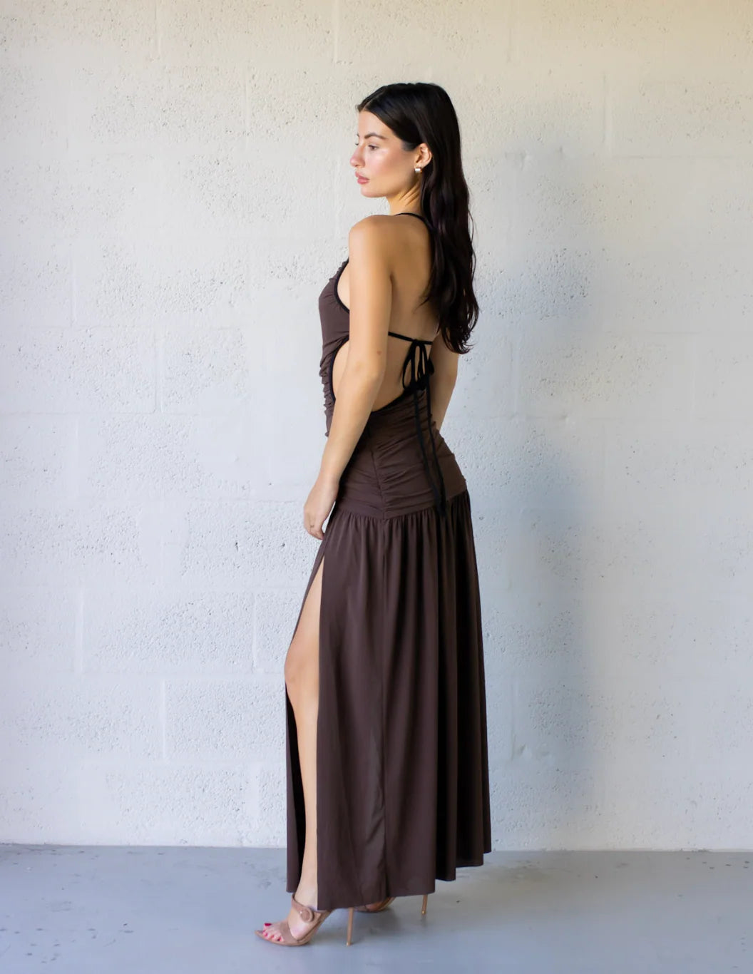 Lena Maxi Dress featuring an asymmetric design, side cut-outs, and a side leg split, perfect for a stylish evening look.