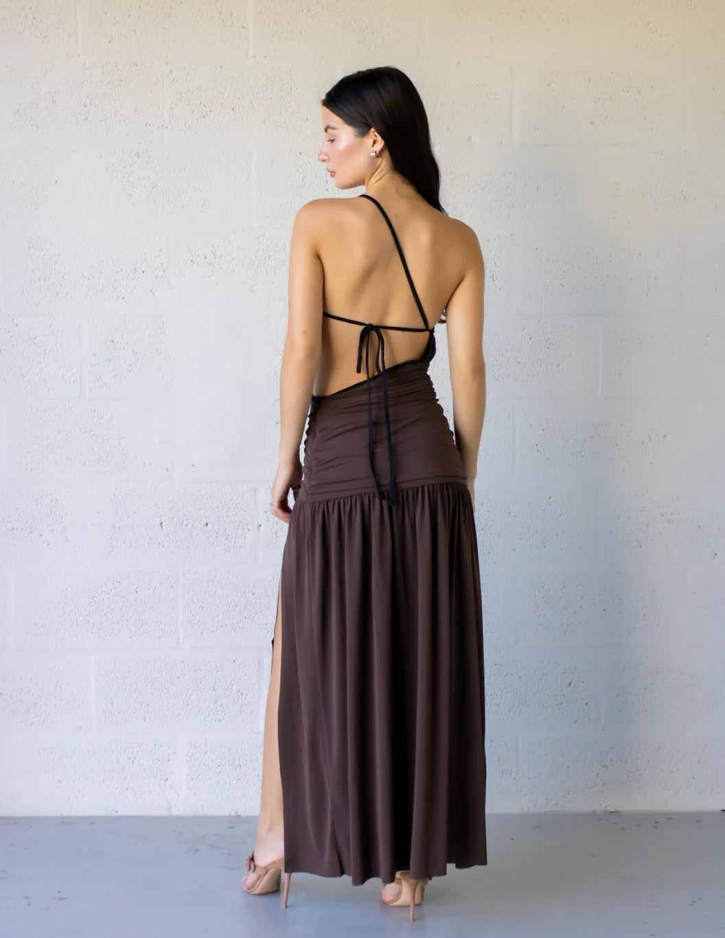 Lena Maxi Dress featuring one-shoulder design, gathered detailing, and side leg split in a beautiful brown color.