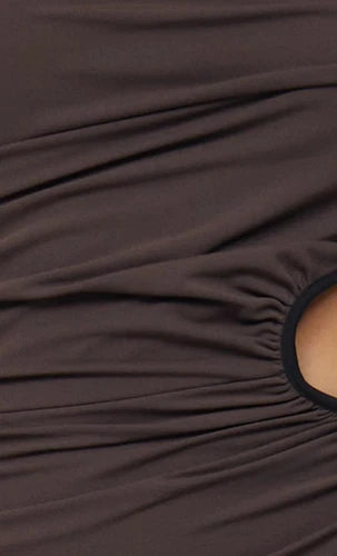 Close up of fabric and mid waist cut out on Lena Maxi Dress. Rent this designer dress rental with Lend the Label